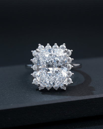 Radiant cur white CZ in halo setting ring.