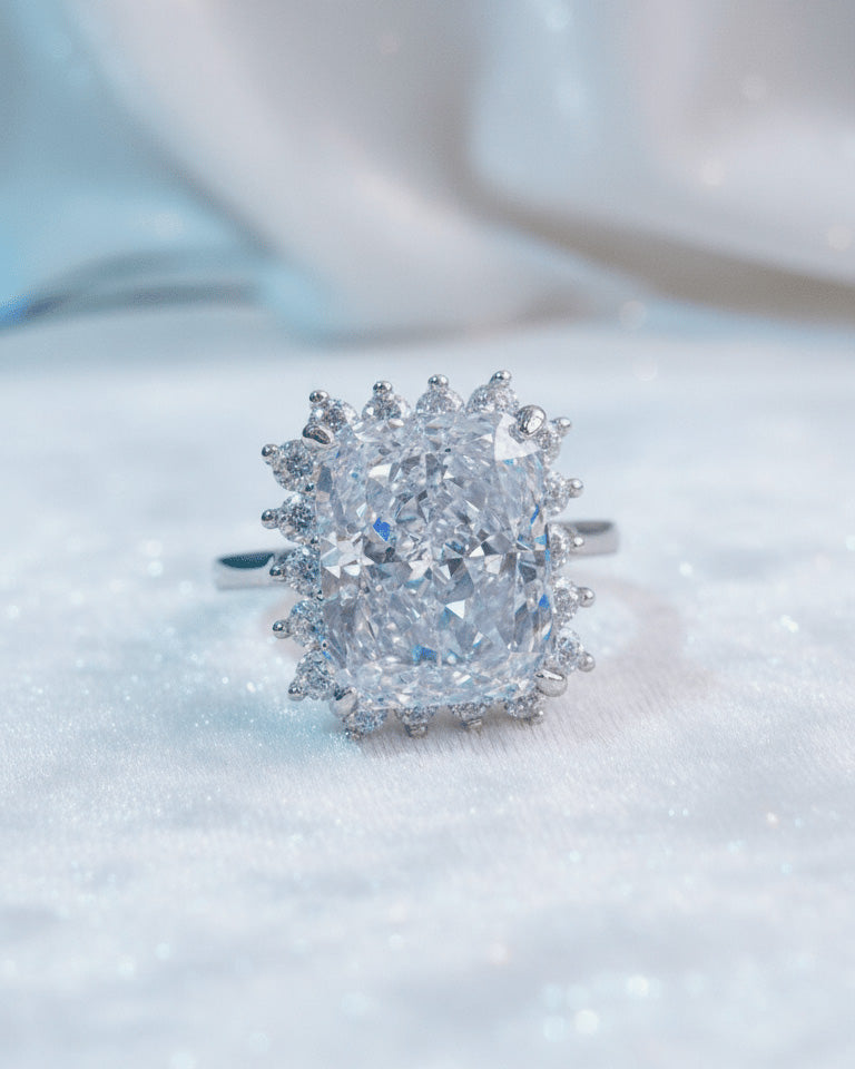 Radiant cur white CZ in halo setting ring.