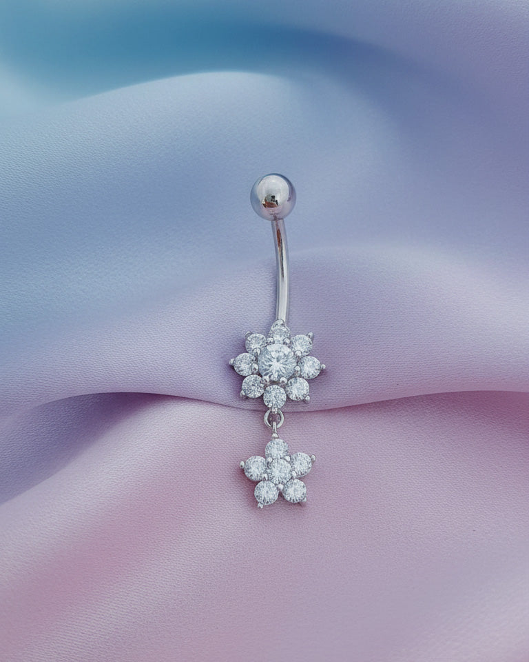 two flower shapes belly piercing.
