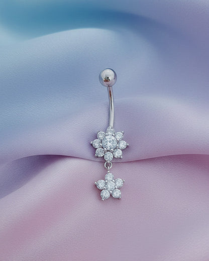 two flower shapes belly piercing.