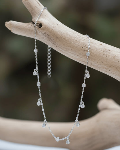 Sterling silver choker of round CZ in bezel setting.