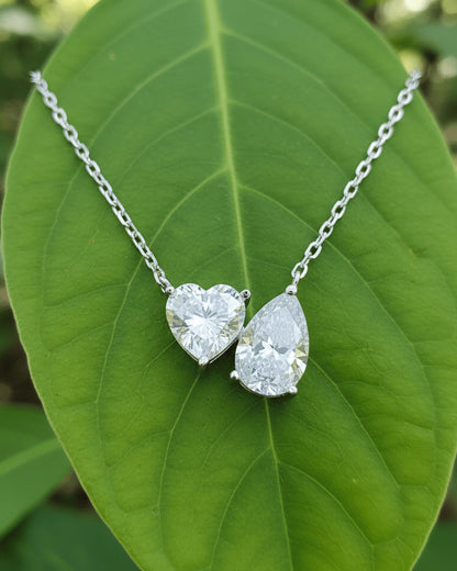 toi et moi heart and pear shape necklace.