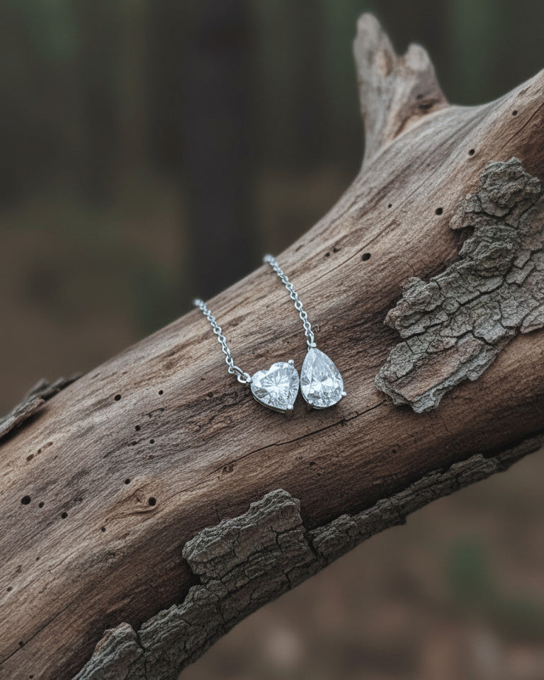 toi et moi heart and pear shape necklace.