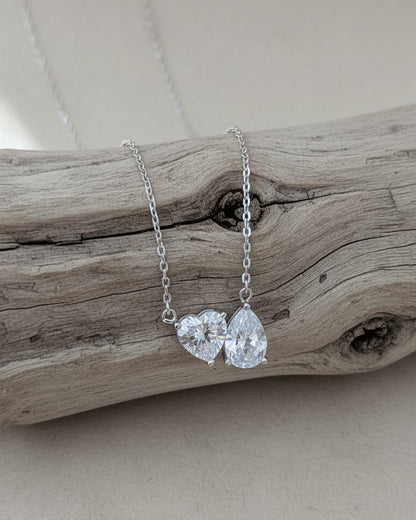 toi et moi heart and pear shape necklace.