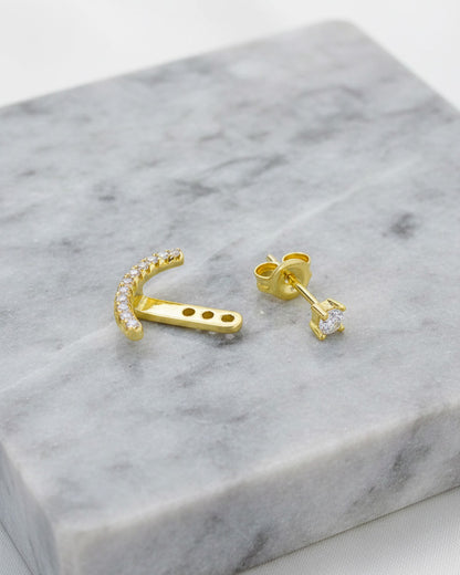 back to front delicate curved line of CZ earring.