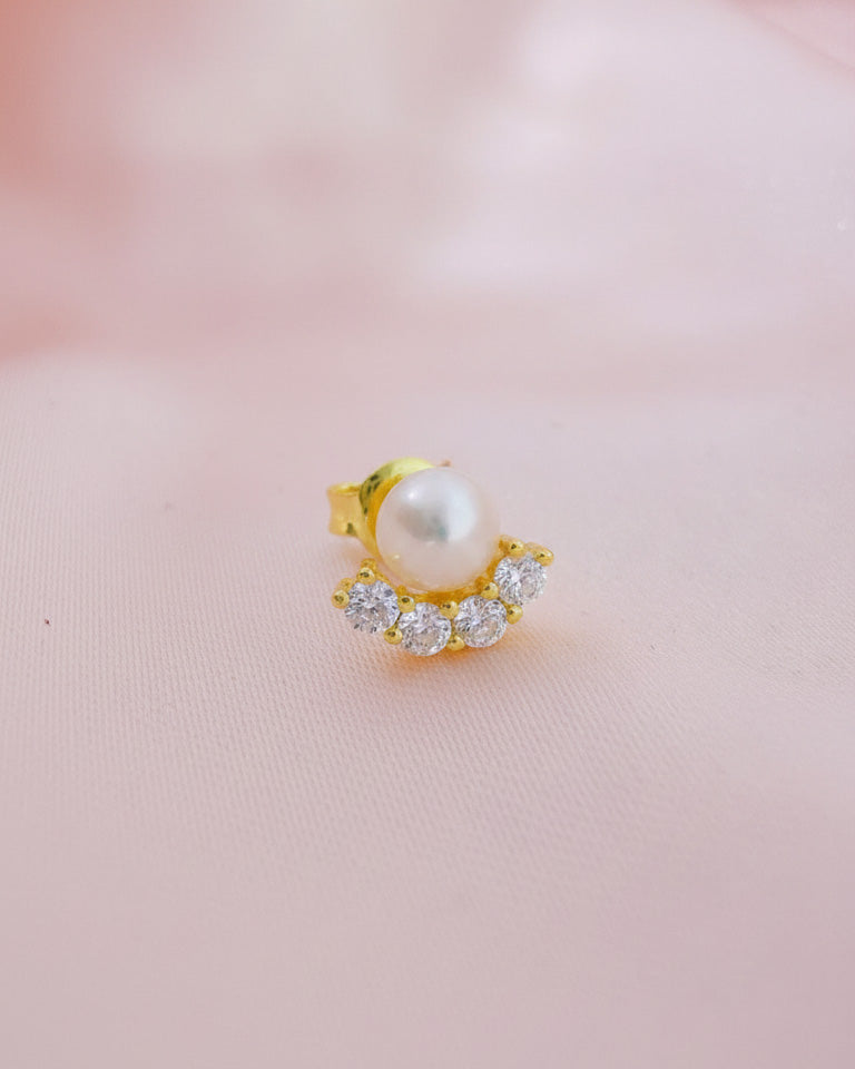 Pearl stud earring with four round CZ stones.