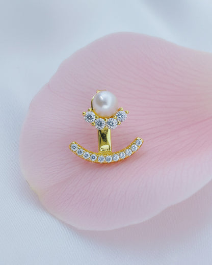 back to front pearl and CZ curved line stud earring.