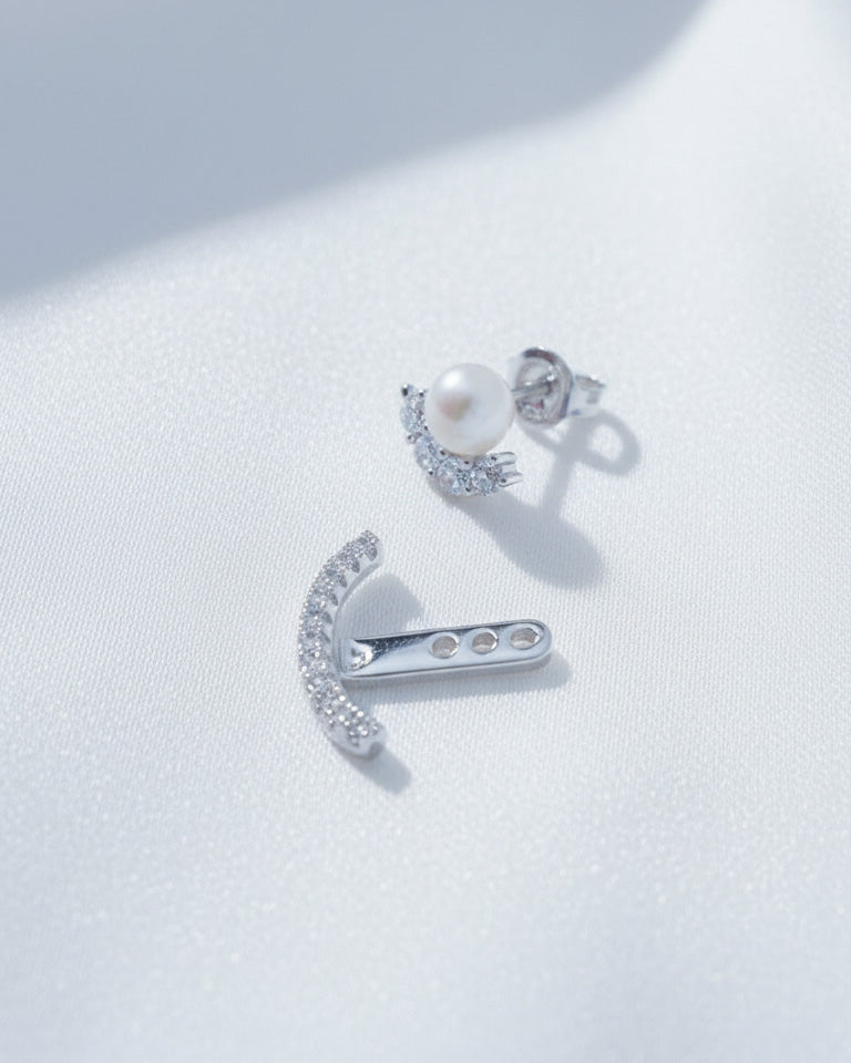 back to front pearl and CZ curved line stud earring.