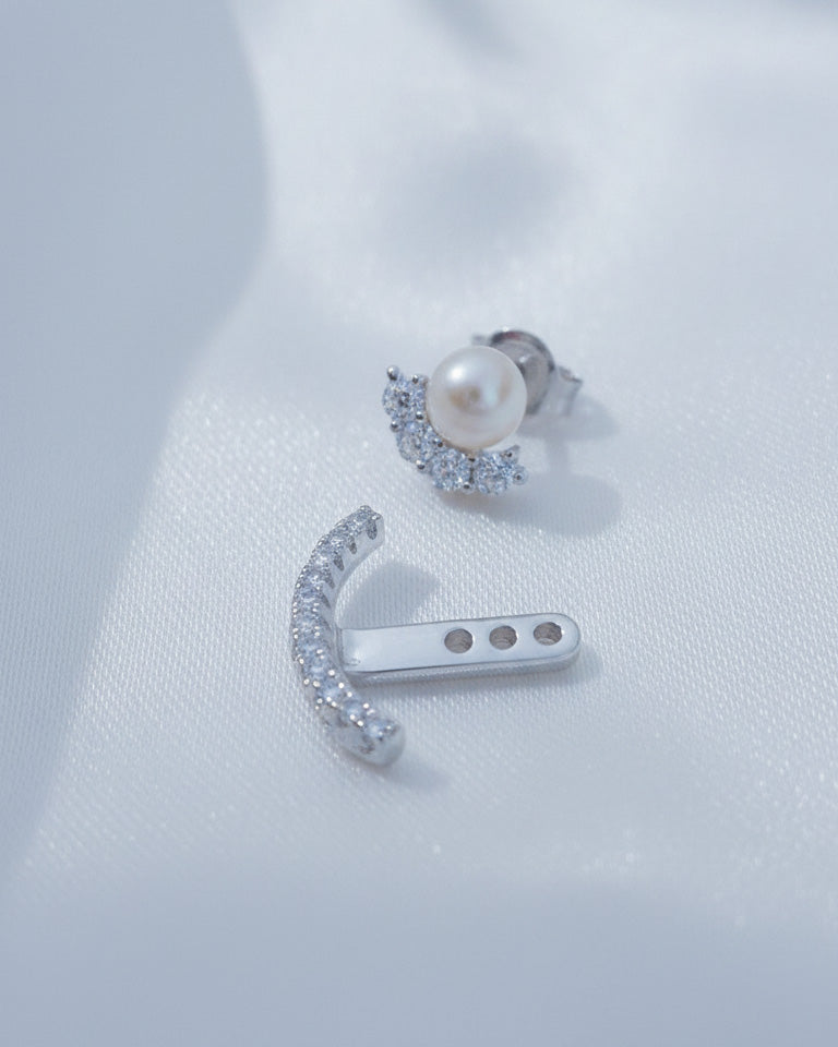 back to front pearl and CZ curved line stud earring.