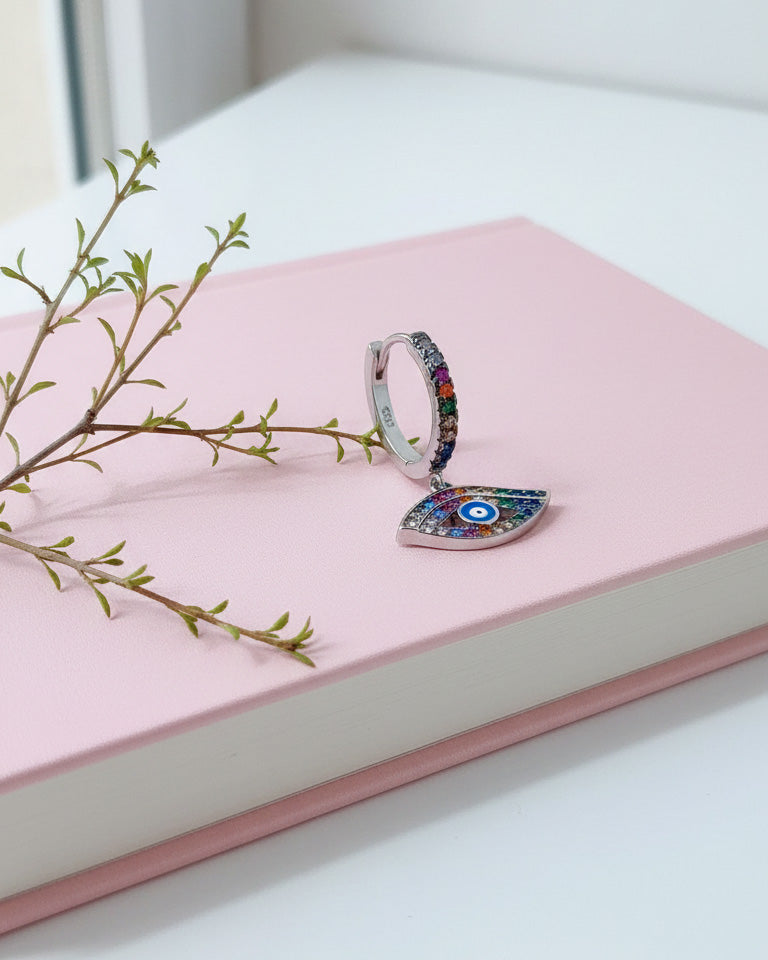 CZ multi color huggie hoop evil-eye earring.