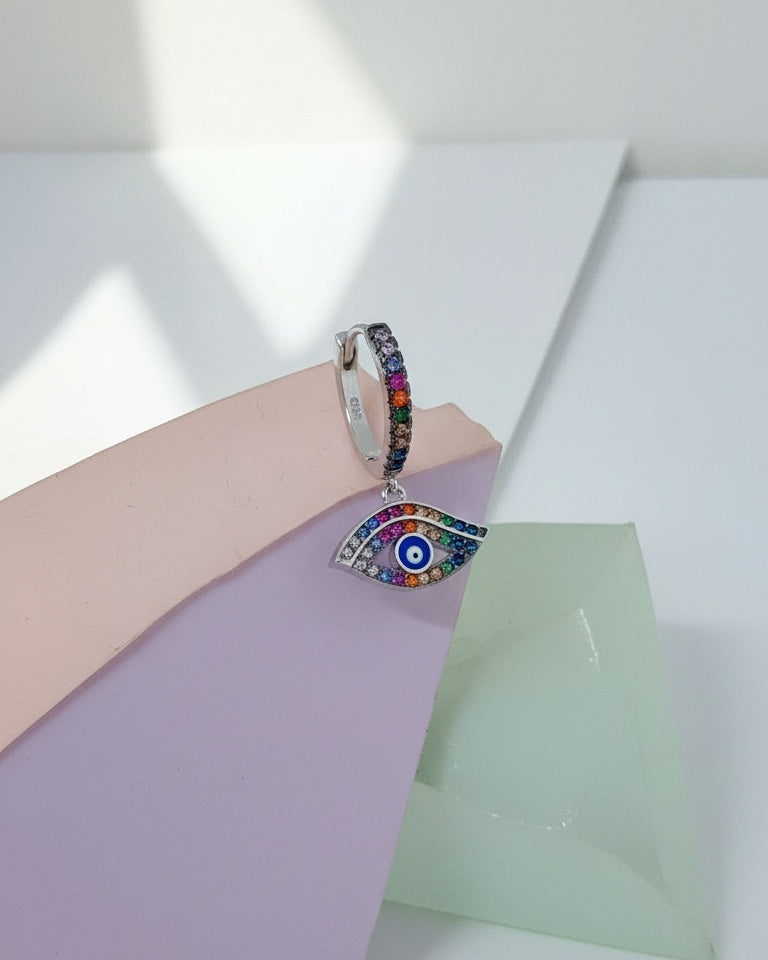CZ multi color huggie hoop evil-eye earring.