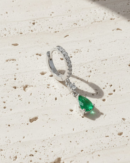 8mm huggie hoop with dangling opaque green pear shape stone.
