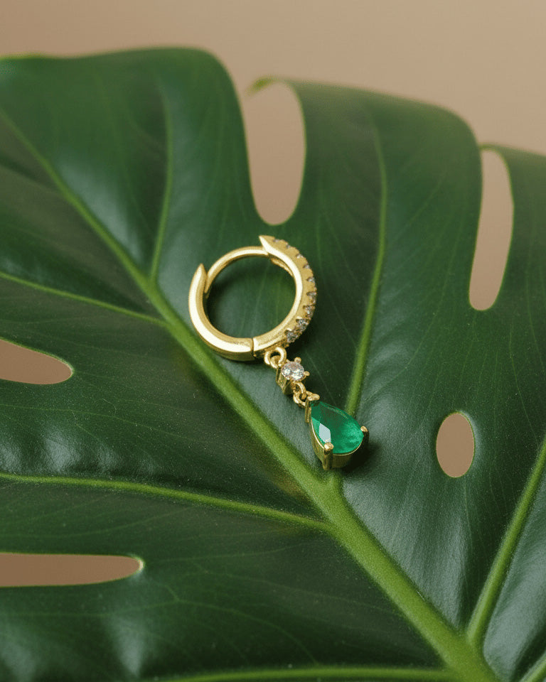 8mm huggie hoop with dangling opaque green pear shape stone.