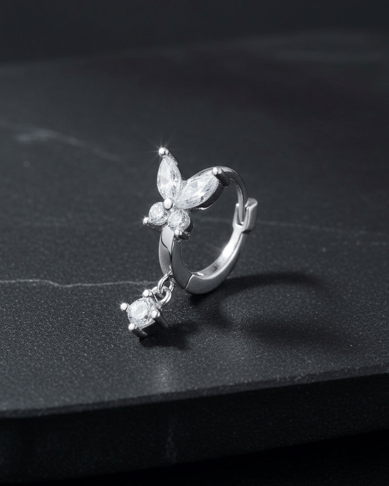 8 mm huggie hoop butterfly earring with dangling round CZ stone.
