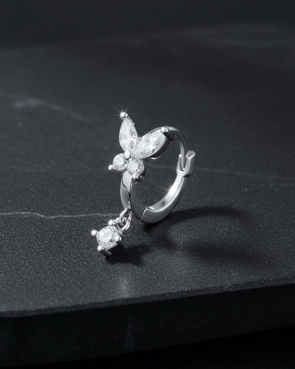 8 mm huggie hoop butterfly earring with dangling round CZ stone.