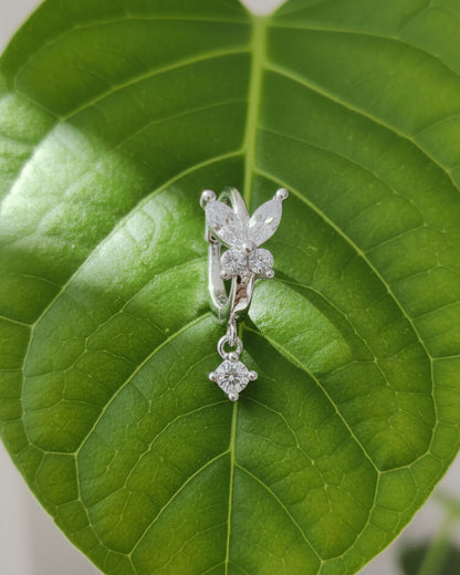 8 mm huggie hoop butterfly earring with dangling round CZ stone.