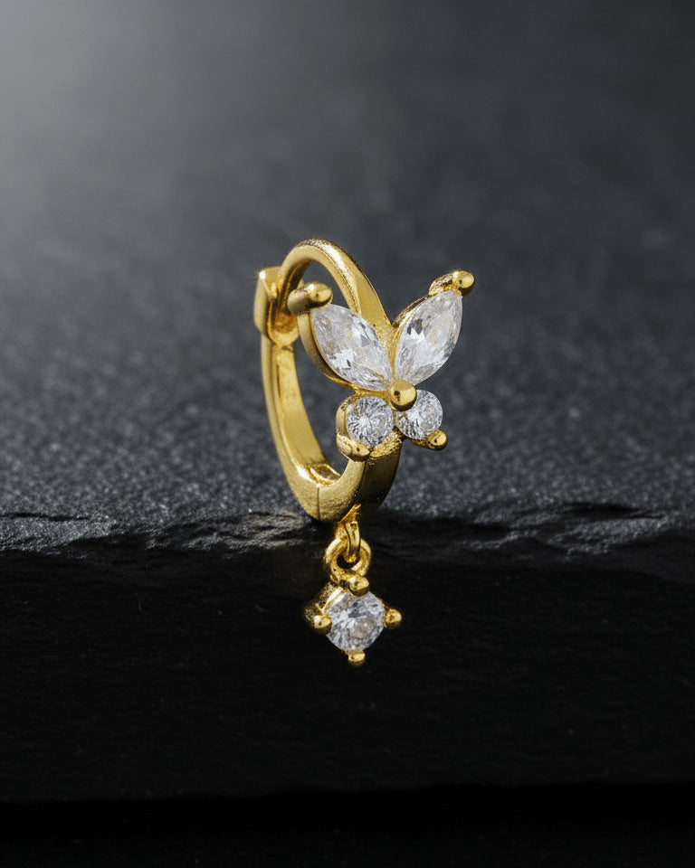 8 mm huggie hoop butterfly earring with dangling round CZ stone.