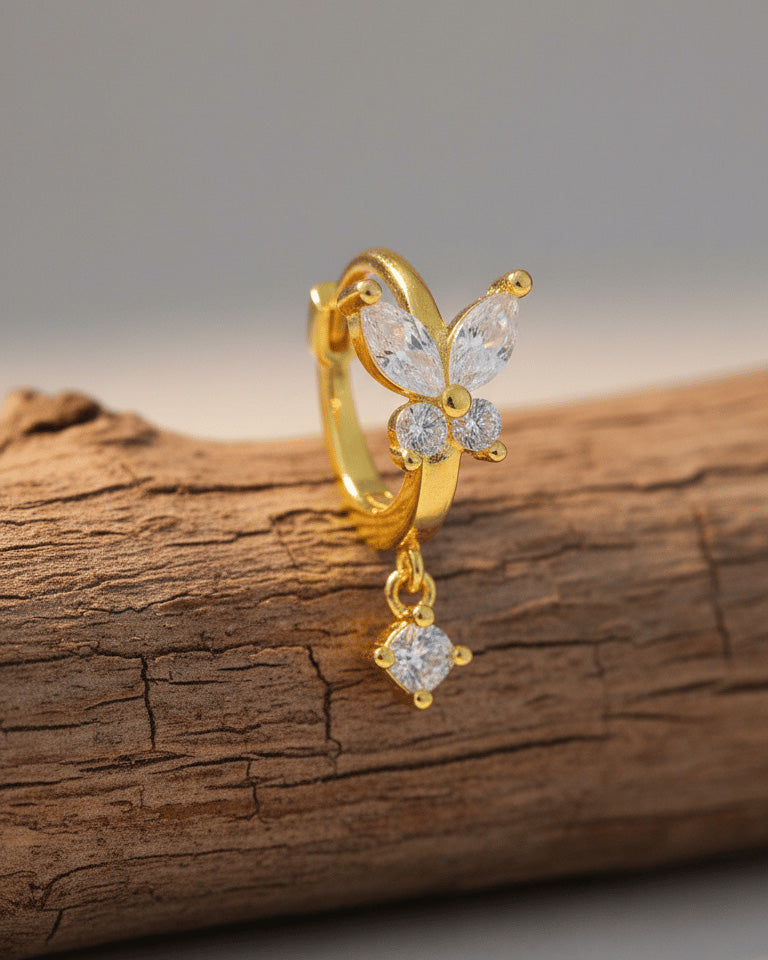 8 mm huggie hoop butterfly earring with dangling round CZ stone.