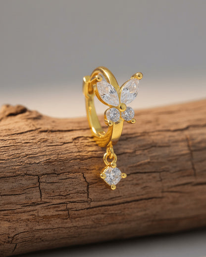 8 mm huggie hoop butterfly earring with dangling round CZ stone.