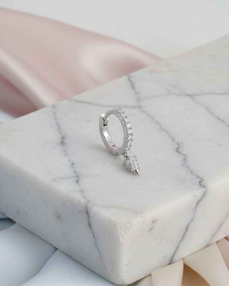 8 mm CZ hoop with dangling cone shape.