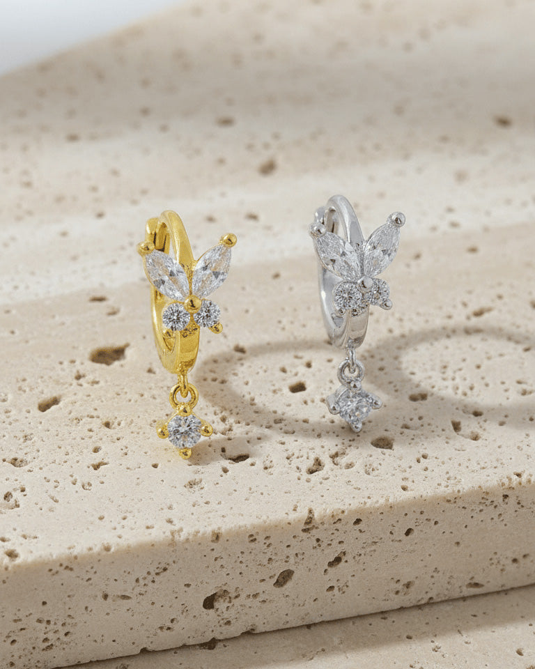 8 mm huggie hoop butterfly earring with dangling round CZ stone.