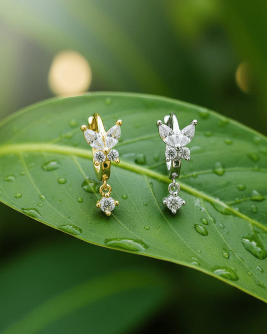 8 mm huggie hoop butterfly earring with dangling round CZ stone.