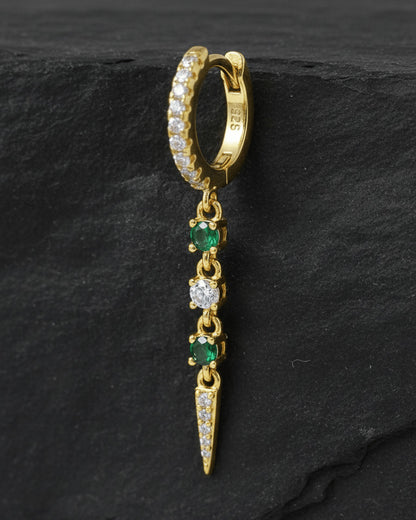 CZ huggie hoop with dangling emerald color and white stones.