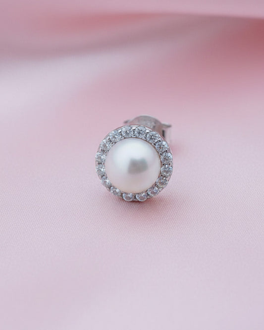 pearl stud earring with halo setting.