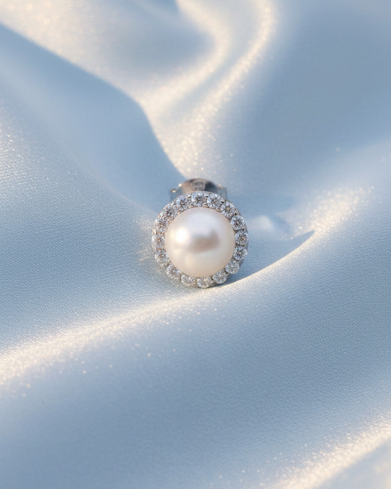 pearl stud earring with halo setting.