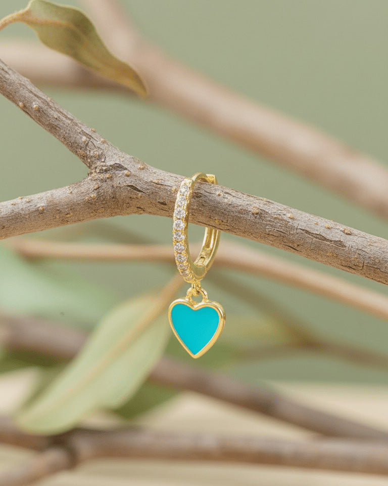 turquoise and pink enamel huggie hoop earrings.