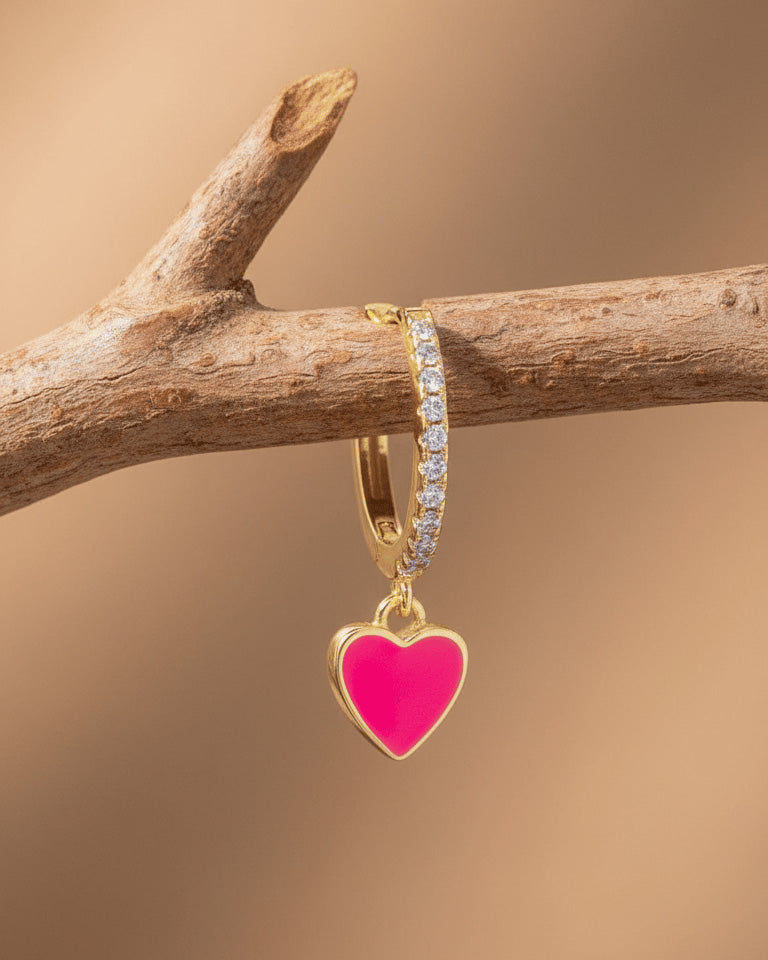 turquoise and pink enamel huggie hoop earrings.