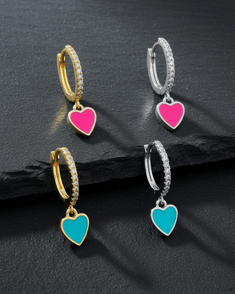 turquoise and pink enamel huggie hoop earrings.