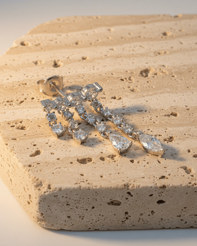 dangling round and fancy shape stones in prong setting stylish earring.