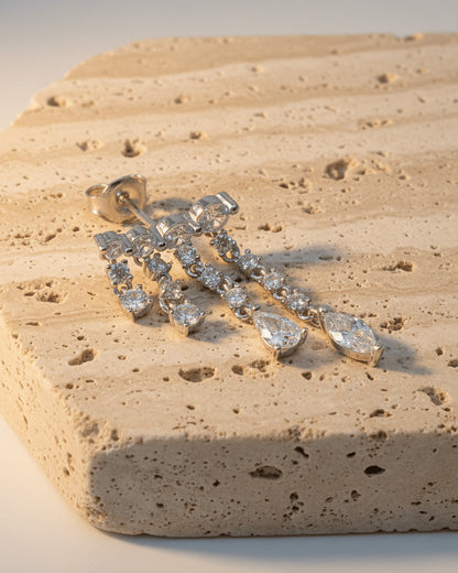 dangling round and fancy shape stones in prong setting stylish earring.