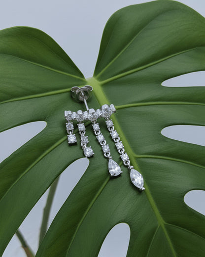 dangling round and fancy shape stones in prong setting stylish earring.