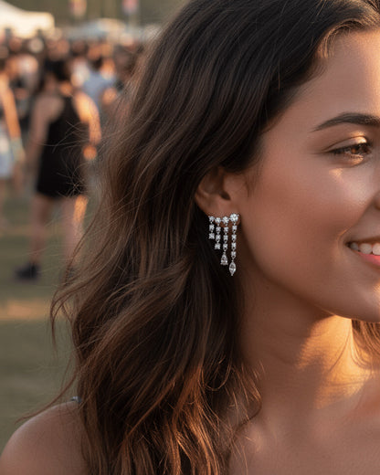 dangling round and fancy shape stones in prong setting stylish earring.
