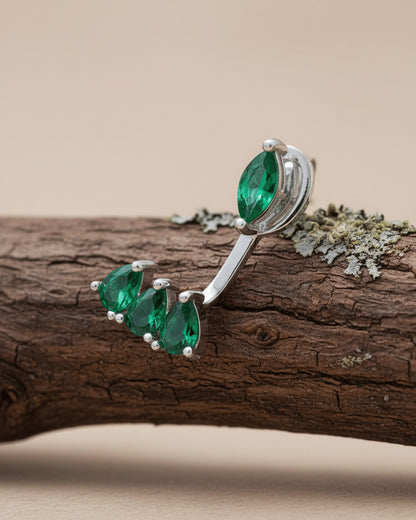 Back and front emerald color marquise and pear shape CZ stones.