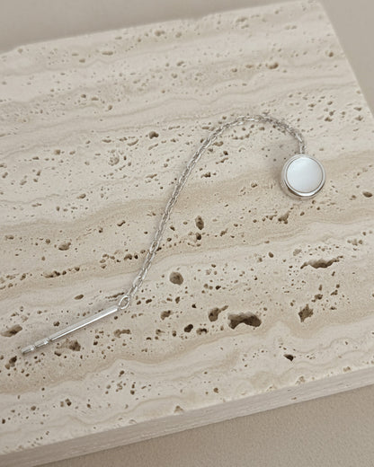MOP disc shape in bezel setting threader earring.