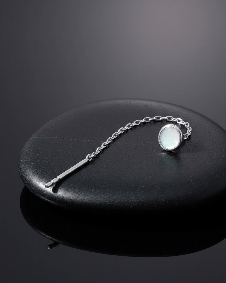 MOP disc shape in bezel setting threader earring.