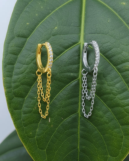 huggie hoop with double dangling chain.