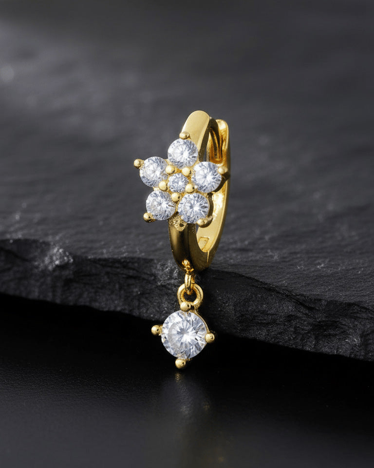8 mm huggie flower cluster setting huggie hoop earring with dangling stone.