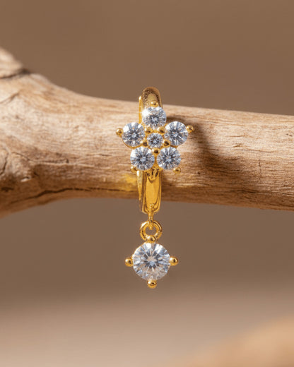 8 mm huggie flower cluster setting huggie hoop earring with dangling stone.