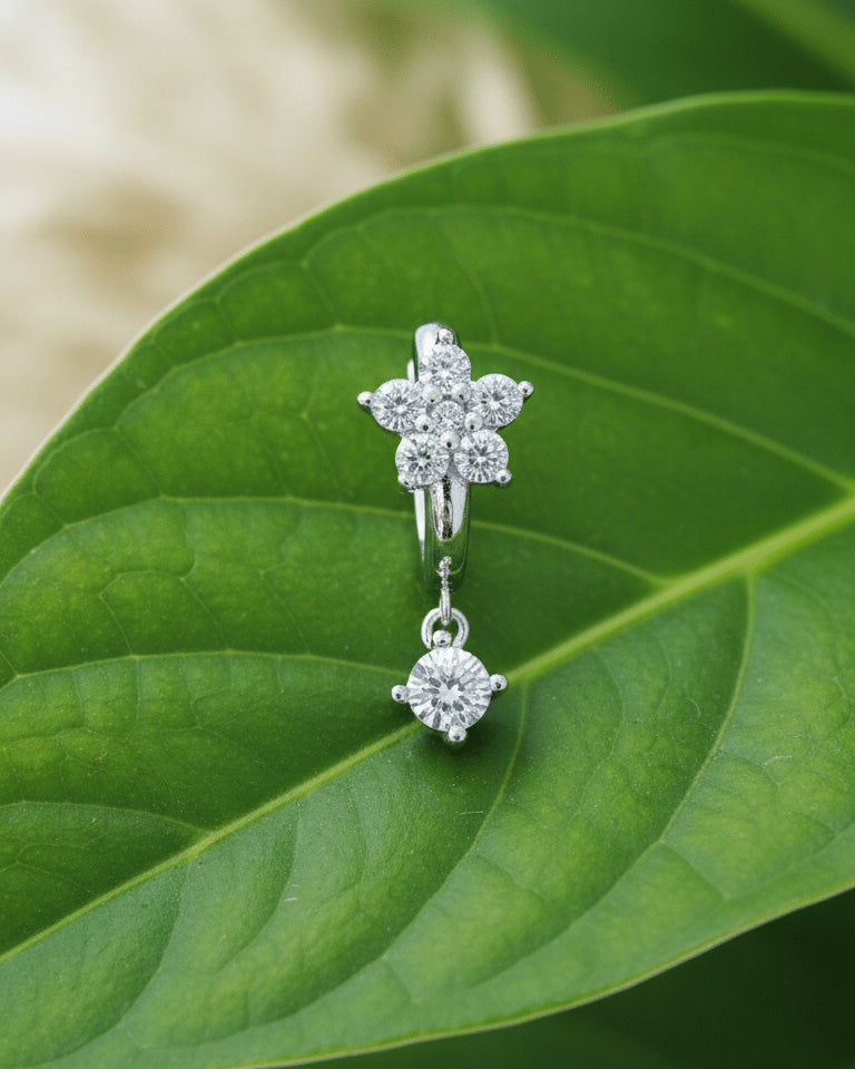 8 mm huggie flower cluster setting huggie hoop earring with dangling stone.