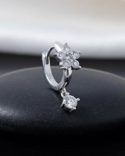 8 mm huggie flower cluster setting huggie hoop earring with dangling stone.