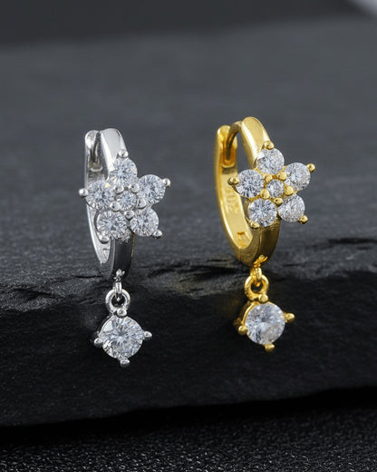 8 mm huggie flower cluster setting huggie hoop earring with dangling stone.