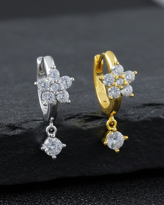 8 mm huggie flower cluster setting huggie hoop earring with dangling stone.