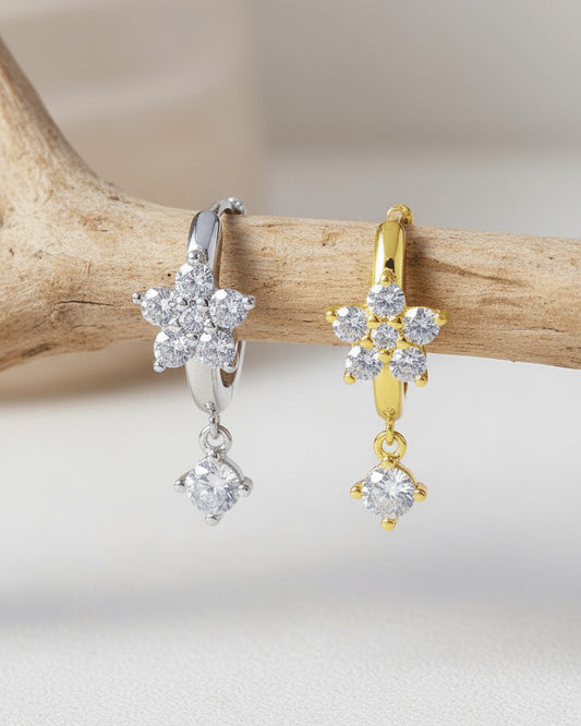 8 mm huggie flower cluster setting huggie hoop earring with dangling stone.