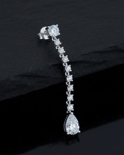 elegant line of round CZ stones ending with a pear shape stud earring.