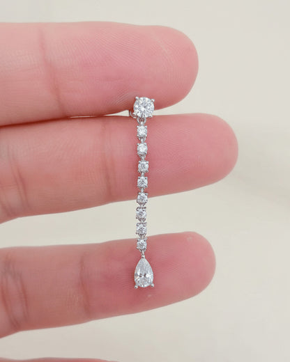 elegant line of round CZ stones ending with a pear shape stud earring.