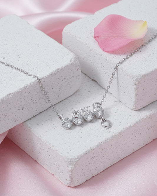 Sterling Silver “LOVE” CZ Necklace with Heart Charm.